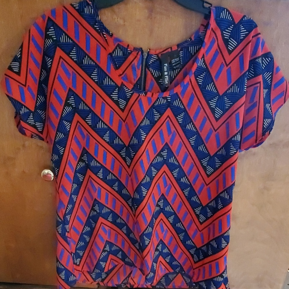 Blue, red, and black patterned top size medium